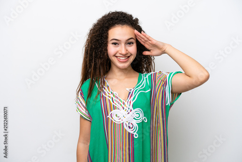 Fotografía Young Arab woman isolated on white background saluting with hand with happy expr
