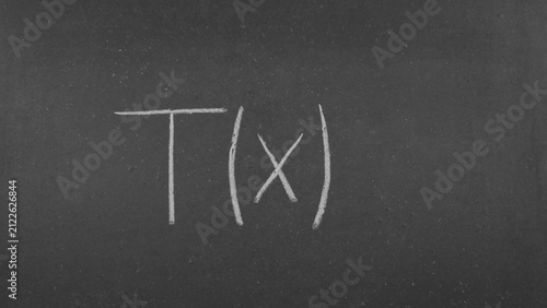 Fotografía Mathematical notation of the function T(x) written in chalk on a blackboard
