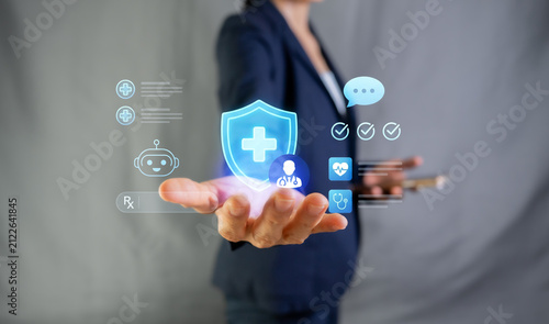 Cuadro en lienzo Businesswoman holding medical shield icon for health insurance, telehealth, and