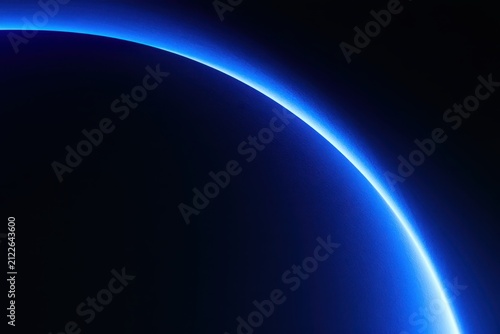 Abstract blue light curve on dark background