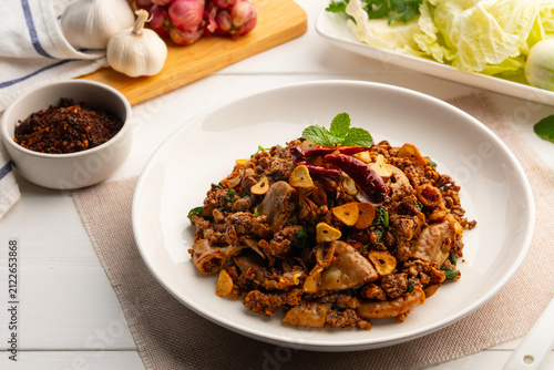Stir fried minced pork salad,Spicy Northern Thai-Style food,fry mixed Ground pork with Pork Large Intestine and pig spleen in chilli paste.(larb moo)
