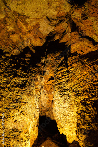 Bild auf Leinwand Natural stalactite and stalagmite formations inside an underground cavern