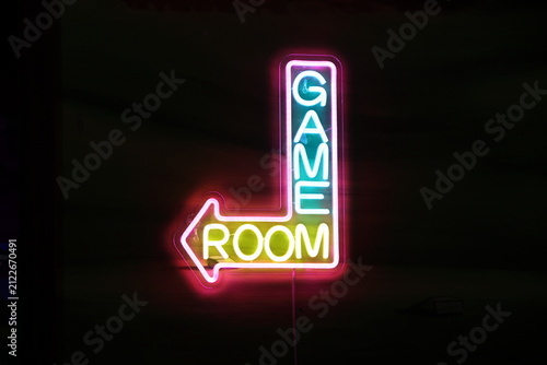 Glow-in-the-dark Mini Golf, Colorful glow in the dark indoor miniature golf course illuminated with neon blacklight