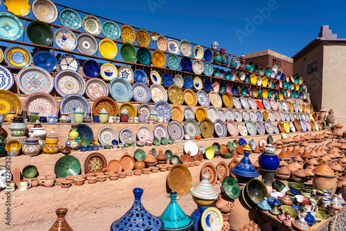 Plates, tajines and pots displayed and ready for sale at an roadside outdoor pottery marke
in Morocco.
