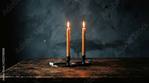 Two Burning Candles On Rustic Wooden Table