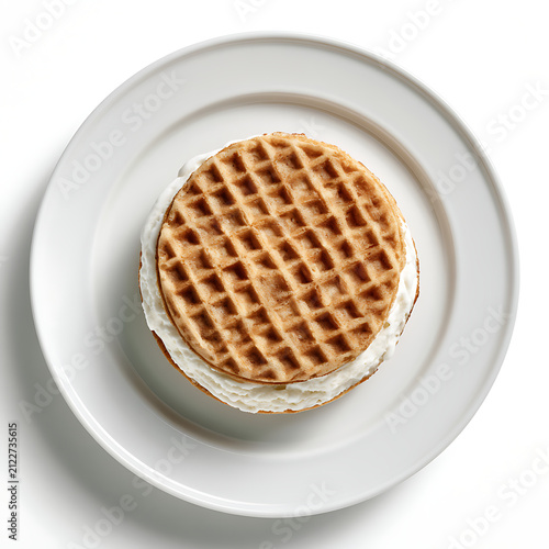 Top down view of waffle ice cream sandwich on a white plate