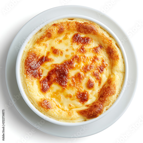 Freshly baked golden brown casserole in a white ceramic bowl from above