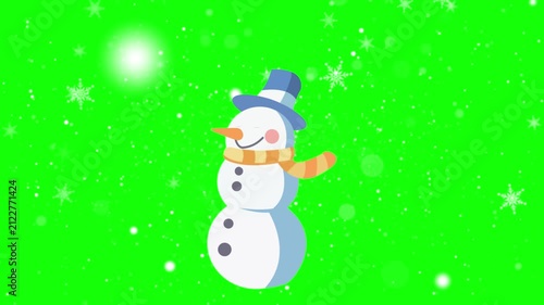Snowman wearing a blue hat and scarf stands amidst a flurry of falling winter snow.