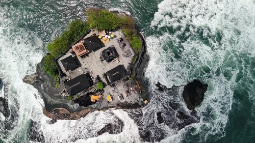 Drone footage of Pura Batu Bolong and Tanah Lot during
