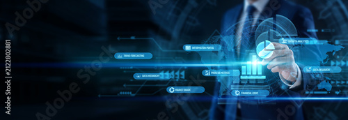 Data statistician whose focused hand has a pen designing Statistical Analysis systems network solutions securely protecting data. Professional administrator continuously operates a global business.