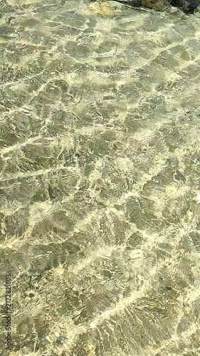 Water stream on the beach