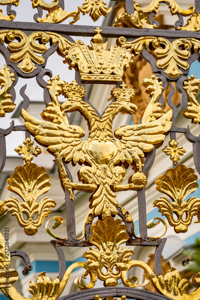 Fototapeta premium The coat of arms of the Russian Empire on the fence of the Catherine Palace. Tsarskoye Selo. Pushkin. 18th century
