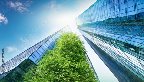 eco architecture green tree and glass office building