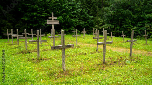 Naklejka Nītaure, Latvia – August 1, 2026: Wooden crosses mark the 1917 graves of Latvian Riflemen and an Unknown Soldier.