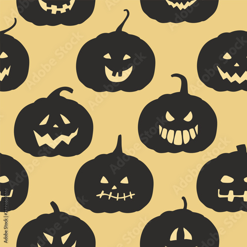Vector autumn pumpkins. Halloween seamless pattern on yellow background.