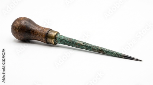 Fotografie Old vintage awl tool with wooden handle and metal spike