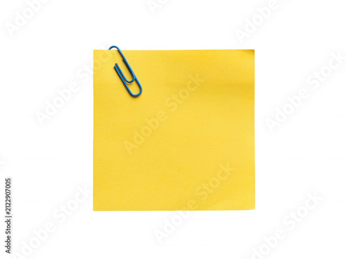 Bright yellow square adhesive paper note with blue paperclip isolated on transparent background for office tasks