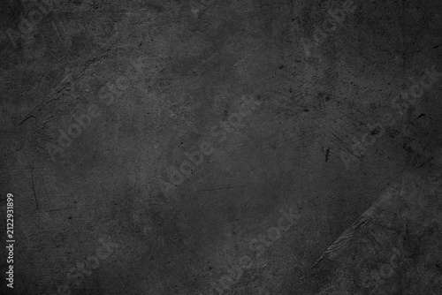 Dark grey textured concrete wall background