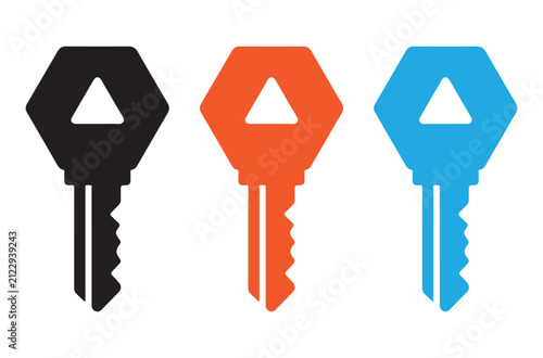 Set of three colorful house keys in black orange and blue isolated on a white background