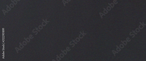 Minimalist dark grey charcoal gradient with subtle grainy texture creating a sleek artistic modern design background