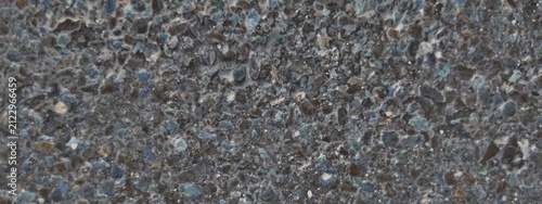 Fotografía Coarse asphalt texture background, dark grey bitumen road surface, rough gravel