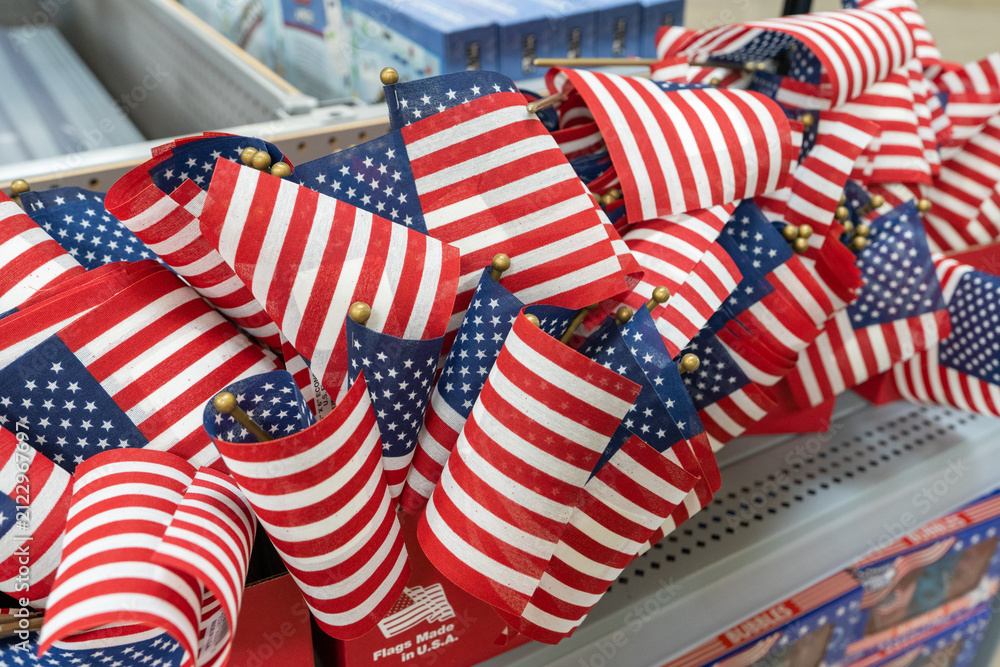 Obraz premium Small American Flags Displayed Together on a Retail Store Merchandise Display
