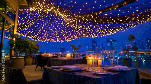 Luxury Rooftop Dining Terrace with Fairy Light Canopy, Candle Lanterns, and Panoramic City Skyline at Night