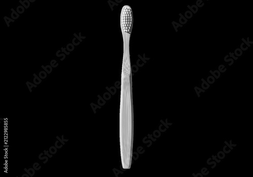 Bamboo toothbrush with natural bristles on display isolated on transparent background