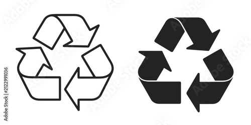 Two recycling symbols, one outlined and one solid black, isolated on a white background, representing sustainability and waste management concepts