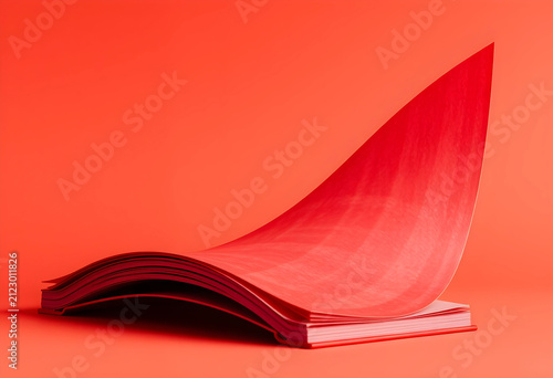 Red book with pages flippin...