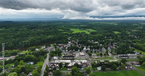 Shawangunk, NY, USA - July 29, 2026. Aerial video of the Hamlet of Wallkill in the Town of Shawangunk NY, Ulster County, on a partly cloudy summer afternoon.	