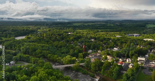 Shawangunk, NY, USA - July 29, 2026. Aerial video of the Hamlet of Wallkill in the Town of Shawangunk NY, Ulster County, on a partly cloudy summer afternoon.	