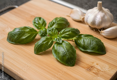 Fresh green basil leaves an...