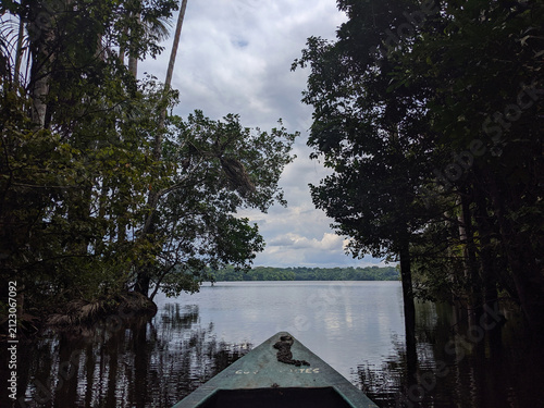 Fotografie Boat entering Sandoval Lake, Tambopata National Reserve, Peruvian Amazon rainfor