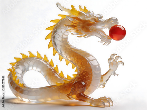 Dragon figurine with red ball