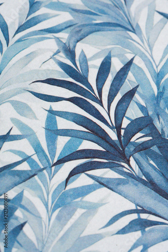 Abstract Soft Blue Watercolor Fern and Palm Frond Leaves Pattern on Textured Paper Surface