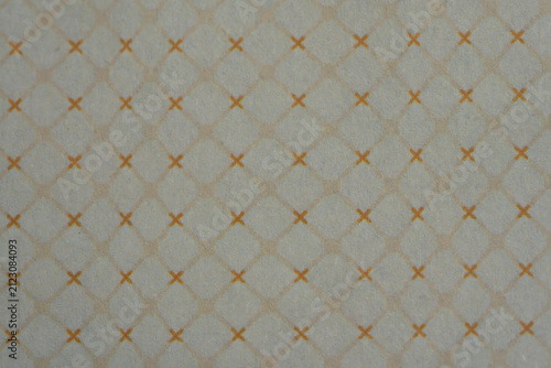 Seamless geometric cross and diamond pattern on off white textured surface