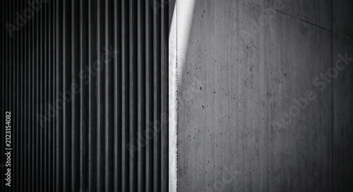 Fotografie Abstract concrete wall background showing contrast between ribbed texture and smooth surface with dramatic light