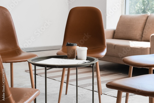 Empty chairs arranged in a ...