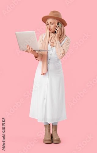 Young Muslim woman in hijab...