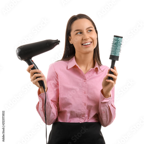 Female hairdresser with dry...