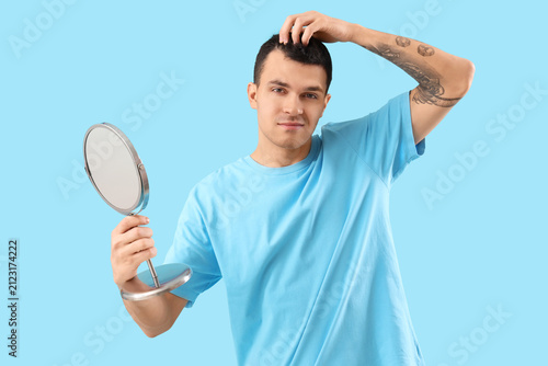 Young man with hair loss pr...