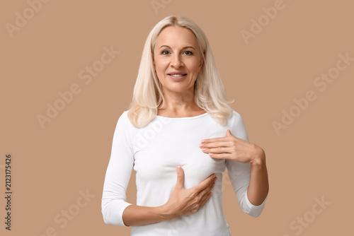 Mature woman checking her b...