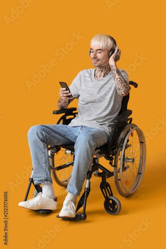 Young tattooed man in wheel...