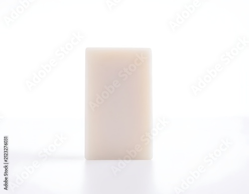 Minimalist abstract white cube on plain background.