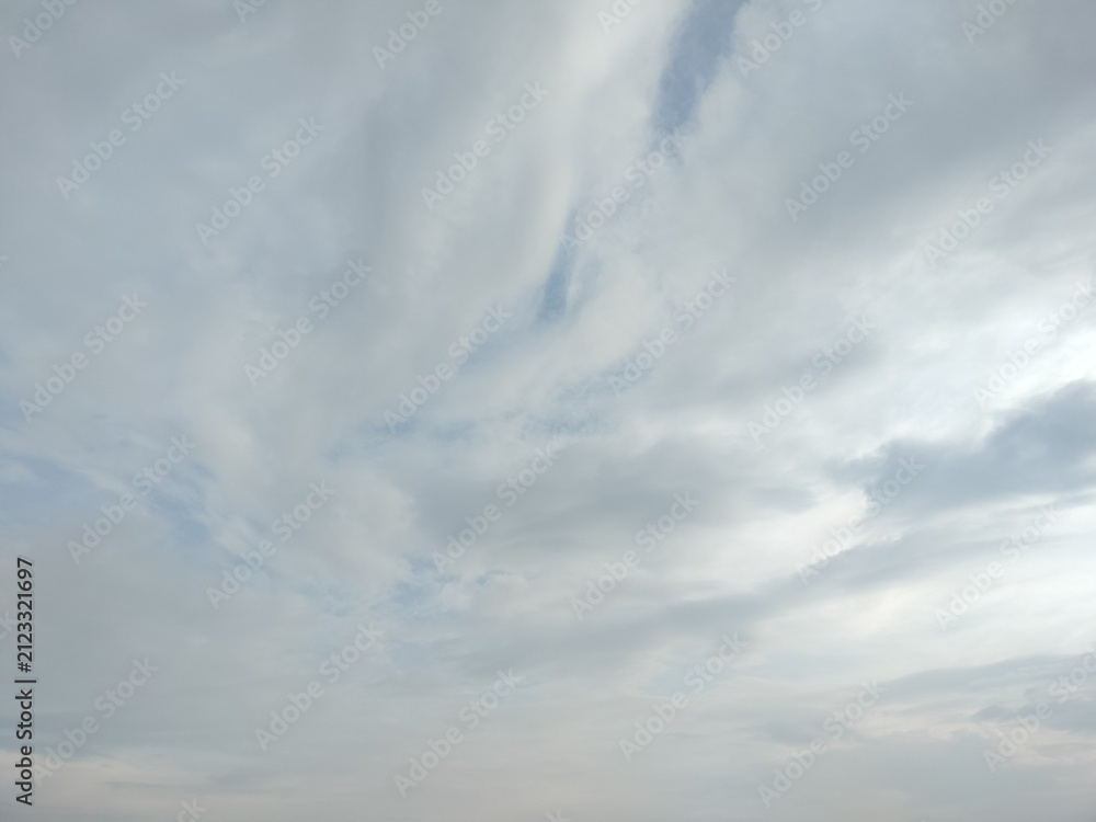 Fototapeta premium Soft white clouds in a bright blue sky