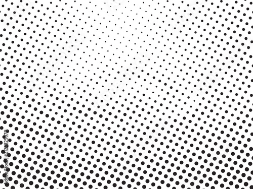Abstract black and white halftone dots pattern background.