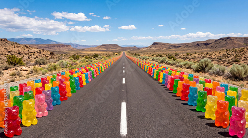Whimsical Landscape with Giant Gummy Bears Along a Scenic Road