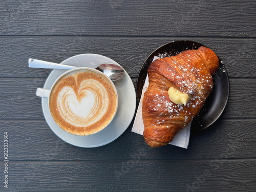 croissant and cup of coffee cappuccino