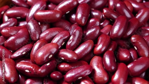 Dried red beans in a wooden bowl